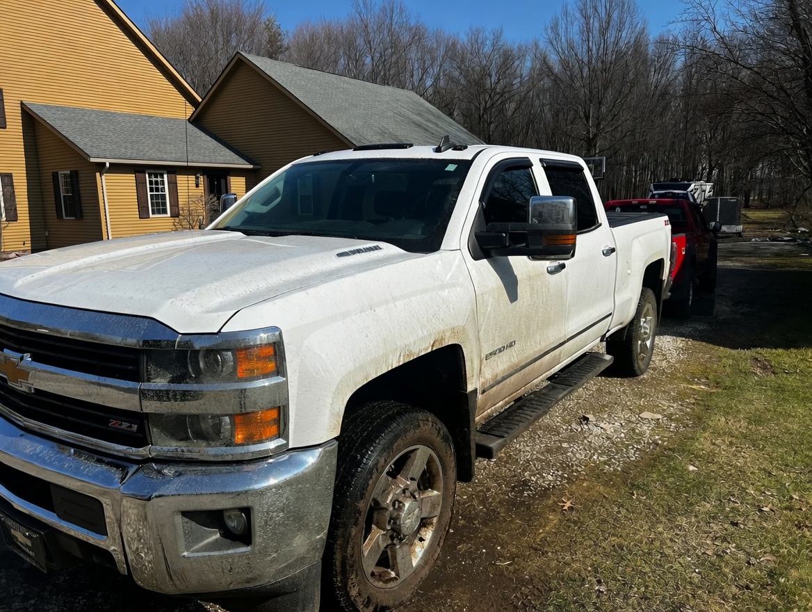 Chevy Silverado 2500HD before detail — dirty and mud-covered